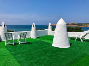 Гостиница Appartamenti In Villa La Marinedda  Исола Росса